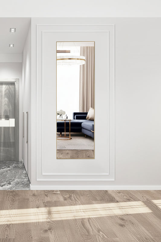 Modern interior with a coat rack and full-length mirror reflecting a living room.
