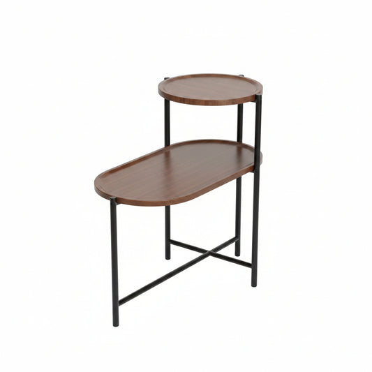 Small round wooden side table with two shelves in a living room setting.